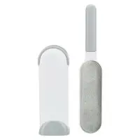 Klädborste med rengörande hållare